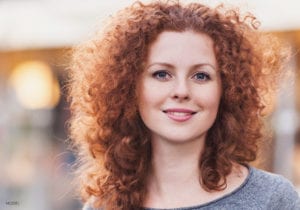 Red Headed Female With Curly Hair